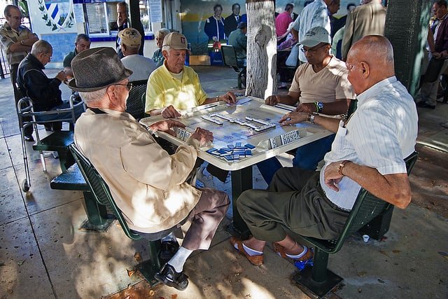 Old men playing Dominoes